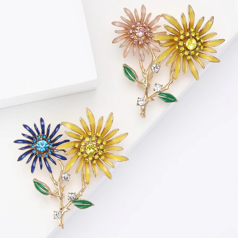 Radiant Sunburst Twin Flower Brooches